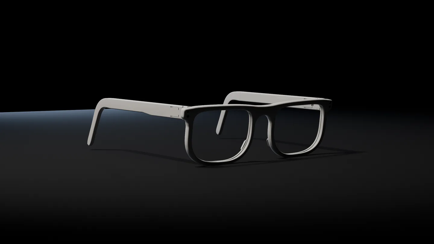 HABIT glasses, white temples and a black front, on a dark floor under one light